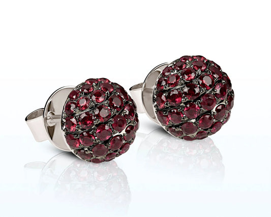 Ohrstecker aus rutheniertem Weißgold mit Rubinen – Strahlend rote Eleganz in edler Halbkugel Tiger Treasure - Qualität, inspiriert seit 1890