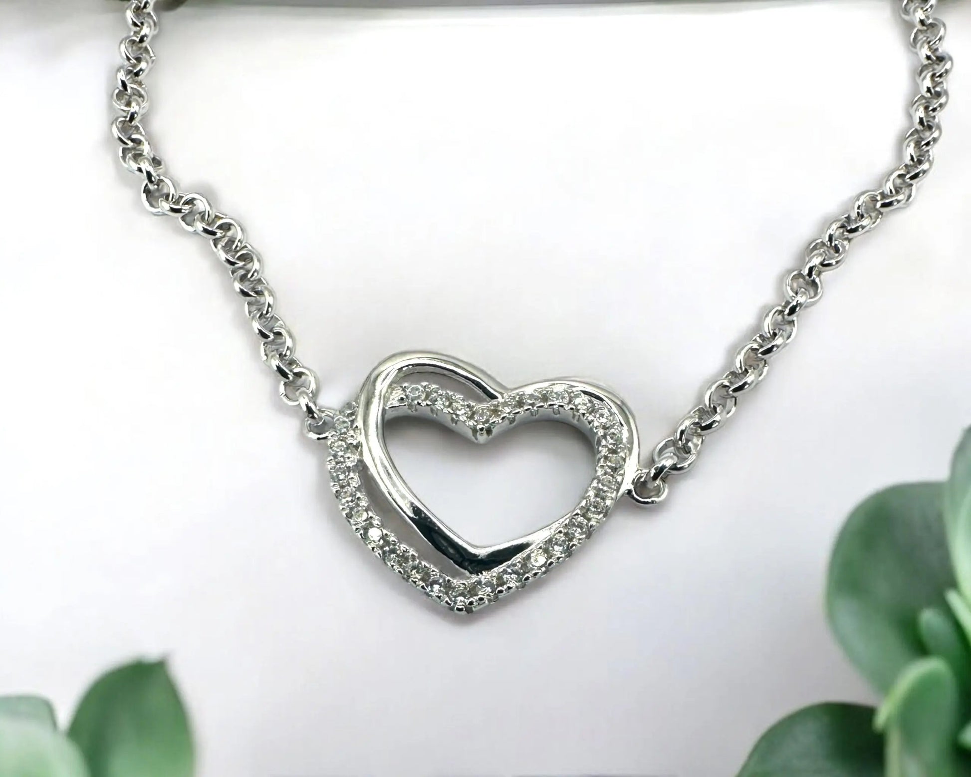 Silber Armband mit facettiertem Zirkonia Herz rhodiniert 18 + 3 cm lang