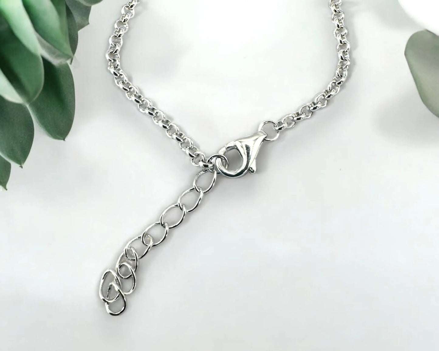 Silber Armband mit facettiertem Zirkonia Herz rhodiniert 18 + 3 cm lang