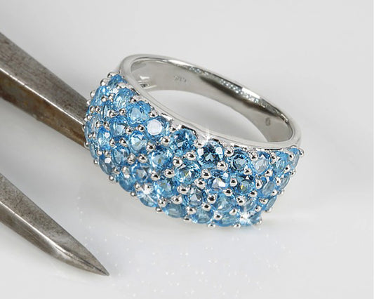 Weißgoldring 585 mit blauem Edeltopas-Pavée Tiger Treasure - Qualität, inspiriert seit 1890