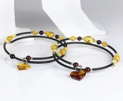 Bernstein-Armband mit Herzanhänger aus Silber