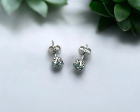 Silber Ohrstecker mit rund facettiertem blauem Edeltopas, 5 mm, rhodiniert