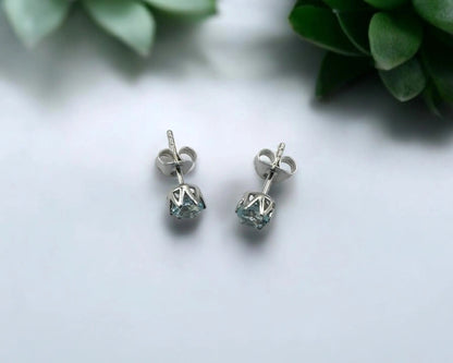Silber Ohrstecker mit rund facettiertem blauem Edeltopas, 5 mm, rhodiniert