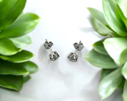 Silber Ohrstecker mit rund facettiertem weißem Edeltopas