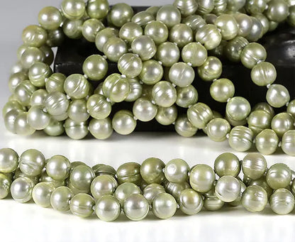 Grüne Süßwasserzuchtperlenkette 255 cm oval
