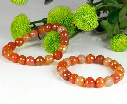 Handgefertigtes Carneol-Armband mit facettierten 10 mm Naturperlen echtes Edelstein-Armband für Vitalität und Eleganz