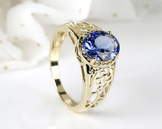 Ring „Tanz der Farben“ – 14K Gelbgold mit Tansanit Tiger Treasure - Qualität, inspiriert seit 1890