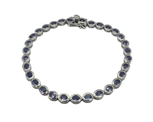 Silber Armband mit oval facettierten Tansanit Edelsteinen in Zargenfassung, 18,5 cm lang