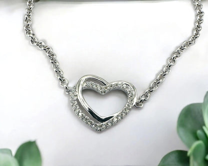 Silber Armband mit facettiertem Zirkonia Herz rhodiniert 18 + 3 cm lang