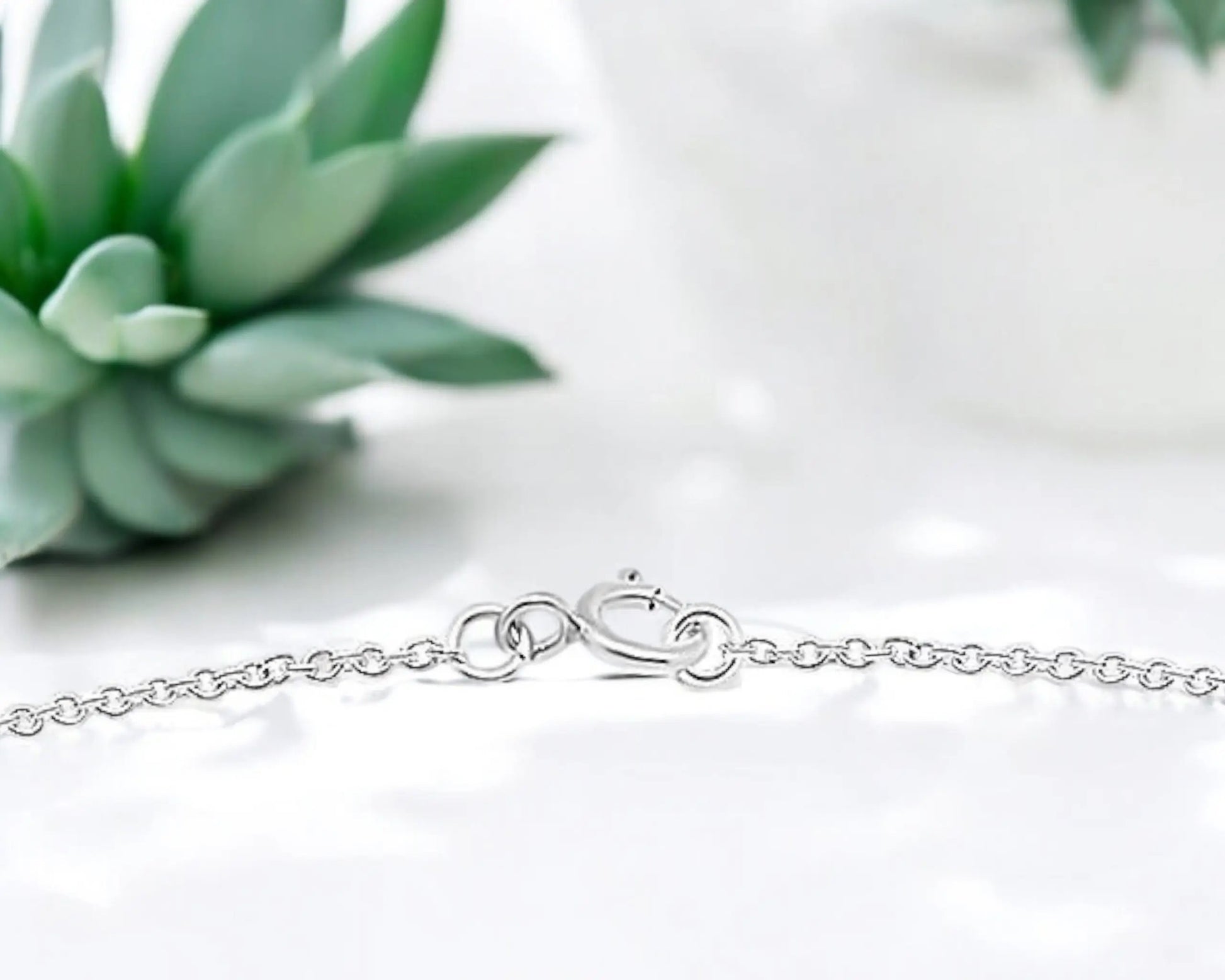 Silberne Fußkette für Damen mit Sternanhänger und Zirkoniasteinen